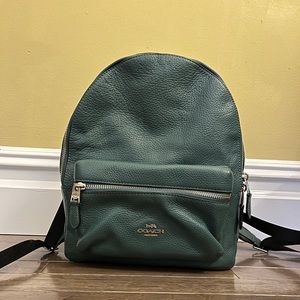 Coach backpack, teal leather with silver metal accents and black straps